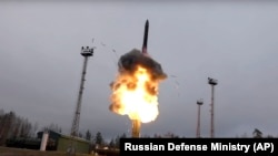 An Avangard intercontinental ballistic missile lifts off from a truck-mounted launcher somewhere in Russia in this undated photo.