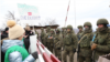 Russian peacekeepers are confronted by Azerbaijanis blocking the road connecting Nagorno-Karabakh to Armenia last week.