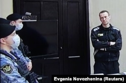 Aleksei Navalny, accused of fraud and contempt of court, is seen via video link during a court hearing at the penal colony where he is being held on March 22.