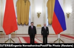 Russian President Vladimir Putin meets with his Chinese counterpart Xi Jinping at the Kremlin in Moscow in 2019.