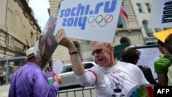 Protesters hold a demonstration against Russian antigay legislation and President Vladimir Putin in front of the Russian Consulate in New York City on July 31.