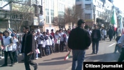 High-school students gather to attend pro-government demonstration in Tabriz on February 11.