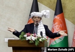 Afghan President Ashraf Ghani speaks during a parliament session in Kabul on October 21.