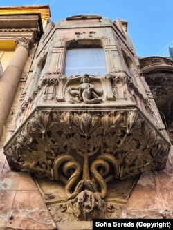 The crumbling facade of a building in central Kyiv