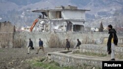 Demolition work is carried out in February on the building where Al-Qaeda leader Osama bin Laden was killed by U.S. special forces in Abbottabad.