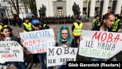 Activists rally outside parliament in Kyiv in support of the language law on April 25.