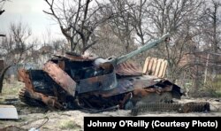 A destroyed Russian armored vehicle near Makariv.