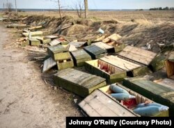 Crates of artillery shells left behind by retreating Russian forces near Makariv.