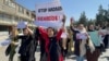 Afghan women protest on October 1 against the attack on students in Kabul the day before.