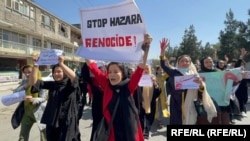 Afghan women protest on October 1 against the attack on students in Kabul the day before.