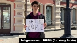 Iskander Gabrakhmanov protests in Kazan against the war in Ukraine on May 9 last year. 