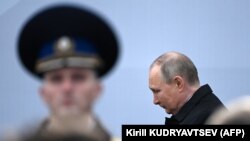 Russian President Vladimir Putin arrives to watch the Victory Day military parade on Red Square in central Moscow on May 9. 