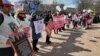 Dozens of people took part in a February 22 protest outside the White House. The demonstrators called on the Biden administration to end the ban on former IRGC conscripts from entering the United States.