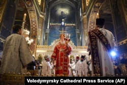 Patriarch Filaret holds Easter service at the Volodymysky Cathedral in Kyiv in 2020.