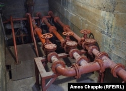 Pipes running from the well in the bunker