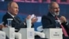 Russian President Vladimir Putin (left) and Armenian Prime Minister Nikol Pashinian attend the 2022 Eastern Economic Forum in Vladivostok on September 7.