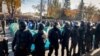 Police remove the tents set up by the Shor Party on the central boulevard in Chisinau on October 10.