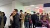 Russians line up for a Kazakh personal identification number at a public service center in Aqtobe in September.