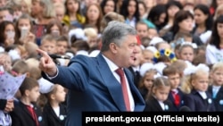 Ukrainian President Petro Poroshenko speaks during a visit to the Kharkiv region on September 1