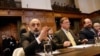 Russian representative Roman Kolodkin (left) and others sit at The International Court of Justice in The Hague last month. 