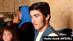 Ahmad Zia, 14, was the only money earner for his extended family of 30 people in Ghor Province. He lost his job as a water bearer for Afghan security forces when the Taliban seized power.  