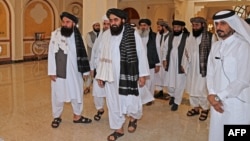 Members of a Taliban delegation arrive for a meeting with foreign diplomats in Doha, Qatar. (file photo)