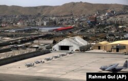 A view of Kabul Military Airport where AC 208 combat caravan aircraft were parked on July 7.