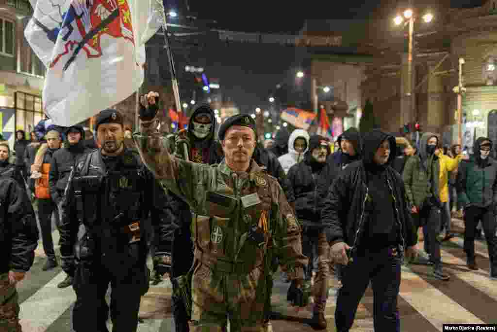 Protesters marched in Belgrade on December 12 in support of ethnic Serbs who erected barricades on the main roads in the north of Kosovo. &nbsp;