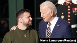 U.S. President Joe Biden (right) welcomes Ukrainian President Volodymyr Zelenskiy on the South Lawn at the White House in Washington, D.C., on December 21.