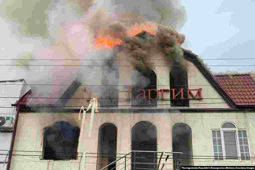 December 7: A fire burns in a shopping center in Nazran, Ingushetia, in the North Caucasus region. The fire reportedly began with an explosion caused by gas, and injured four people.&nbsp;