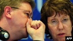 EU foreign-policy chief Catherine Ashton (right) with EU Enlargement Commissioner Stefan Fuele