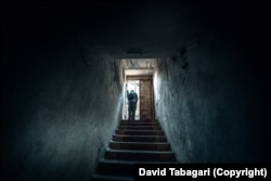 A digger steps into the street after a session in Tbilisi’s underground network.