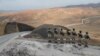 Turkish forces man the new border wall along the Turkish-Iranian border in Turkey's Van Province. 