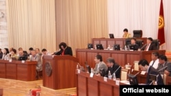 File photo of Kyrgyz parliamentary deputies at work