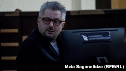 Georgian opposition journalist Nika Gvaramia is seen in court during his trial on corruption charges.