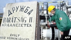 A Hungarian engineer checks the pressure at a refinery plant of the receiving station of the Druzhba oil pipeline in Szazhalombatta.