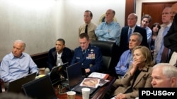 John Brennan, President Barack Obama's top counterterrorism adviser, seen second from right in an official White House photo of U.S. officials watching the conduct of operation in May to kill Osama bin Laden.