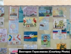 A selection of the children's drawings. The picture in the center, second from top, says: "Thank You For Victory."