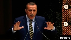 Turkish Prime Minister Recep Tayyip Erdogan has called a corruption probe a "dirty" plot to try to topple his government.