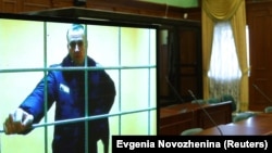 Russian opposition leader Aleksei Navalny appears via video link from the prison in Pokrov before a court hearing to consider an appeal against his prison sentence in Moscow, Russia on May 17.