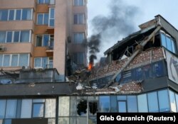 An apartment building damaged by shelling in Kyiv on February 26.