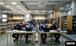 Students in the central library of the University of Tehran. Prominent journalist Abbas Abdi said Iranian authorities were firing academics to rid educational facilities of their views. But he said such moves were likely to backfire.