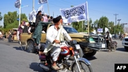 Members of the Taliban and its supporters participate in a parade in the southern Afghan city of Kandahar. (file photo)