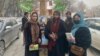 Professor Ismail Mashal (center), an Afghan academic, was arrested by the Taliban for protesting its ban on women's education.