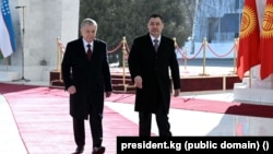 Uzbek President Shavkat Mirziyoev and his Kyrgyz counterpart, Sadyr Japarov, during the Uzbek leaders's state visit to Kyrgyzstan on January 27.