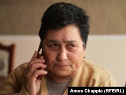 Margo Baghdasarian speaks by phone to her daughter inside Nagorno-Karabakh from a hotel in Goris on February 9.