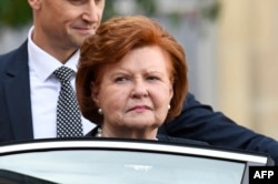 Former Latvian President Vaira Vike-Freiberga leaves the Elysee Presidential Palace in Paris on September 30, 2019, following a luncheon after a church service for former French President Jacques Chirac.