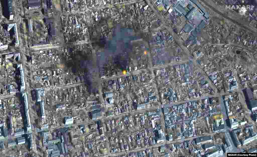 A color infrared view of fires burning near Fontanna Street in eastern Mariupol on March 14.