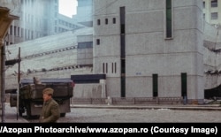 A Romanian soldier stands near the Ministry of Transport Computer Center in Bucharest.