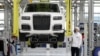 An employee checks an Aurus Senat car on an assembly line at the Aurus manufacturing plant in the town of Yelabuga in the Russian Republic of Tatarstan. (file photo)